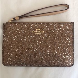 COACH Gold sparkle clutch/wristlet.
